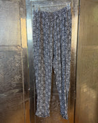 Front view of Alice + Olivia Geometric-Print Pants Size M
