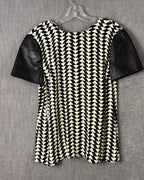 Black and White Geometric Shift Dress with Contrast Faux-Leather Sleeves — front geometric contrast sleeves