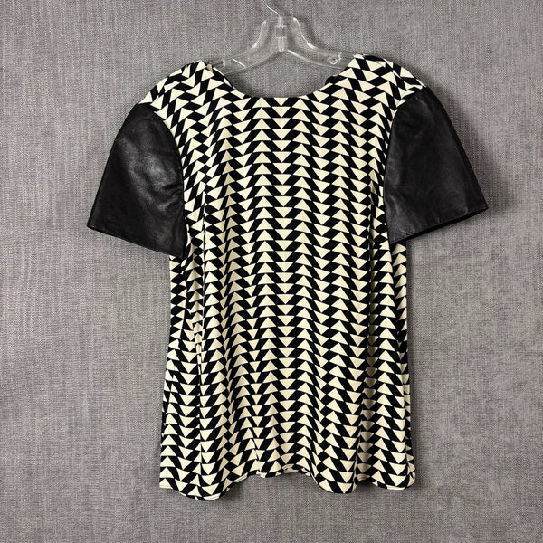 Black and White Geometric Shift Dress with Contrast Faux-Leather Sleeves — front geometric contrast sleeves
