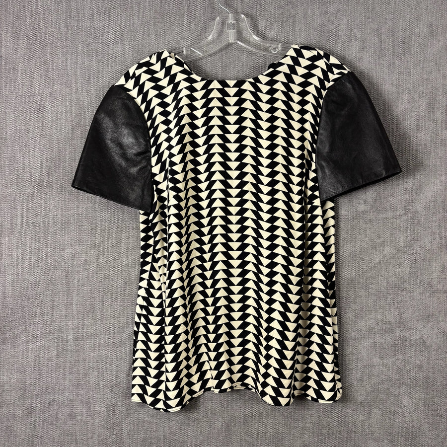 Black and White Geometric Shift Dress with Contrast Faux-Leather Sleeves — front geometric contrast sleeves