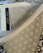Brand and Size Tag view of Topshop Embroidered Blouse