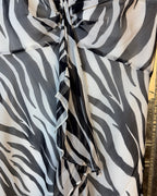 Detail view of Zebra-Print Ruched Strapless Maxi Dress