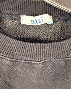 Brand and Size Tag 01 view of Nāti Malibu Graphic Sweatshirt