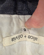 Brand and Size Tag view of Alice + Olivia White Tailored Shorts Size 6