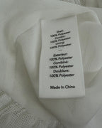 Care Tag 02 view of Elizabeth and James Layered Pleated Peplum Top Size S