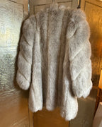 OUTERLAYERS Faux Fur Coat