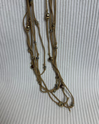 Multi-Strand Faux Suede Cord Beaded Necklace - clothing tag photo