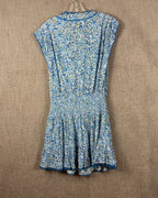Back view of Poupette St Barth blue floral pull-on mini dress size M