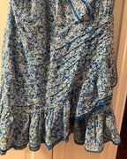 Smocked waist and ruffled hem detail