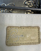 PAIGE Hidden Hills White Flare Jeans — Back Patch Detail